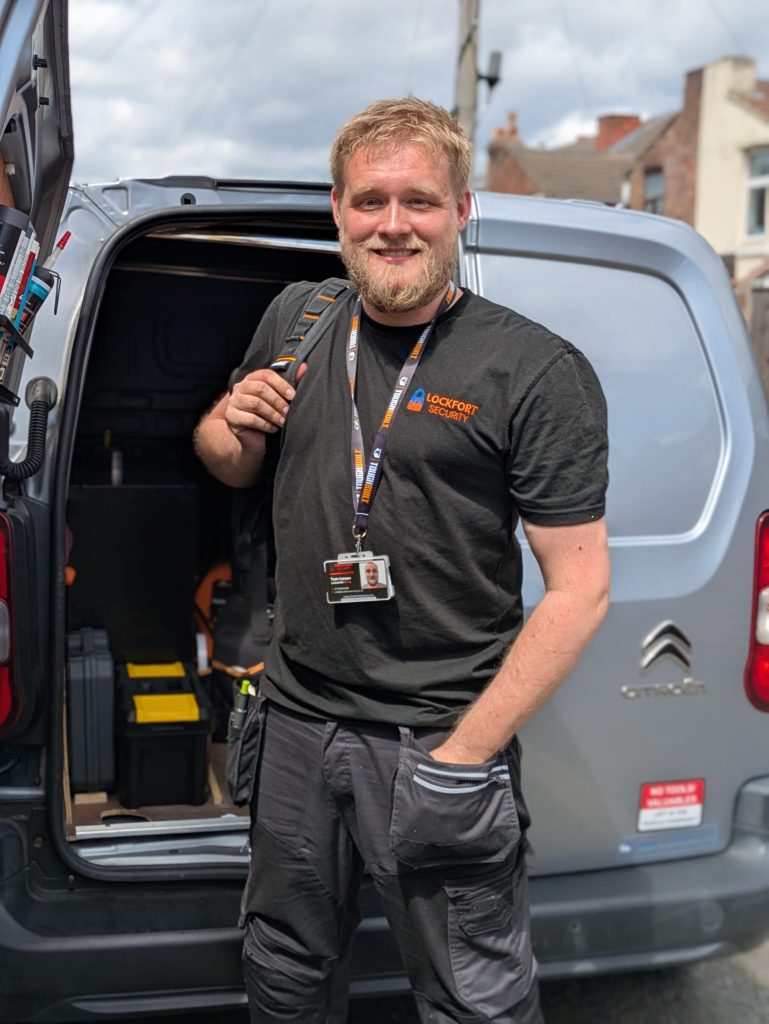 Tom Iveson - Locksmith in St Helens at LockFort Security stood in front of his locksmith van